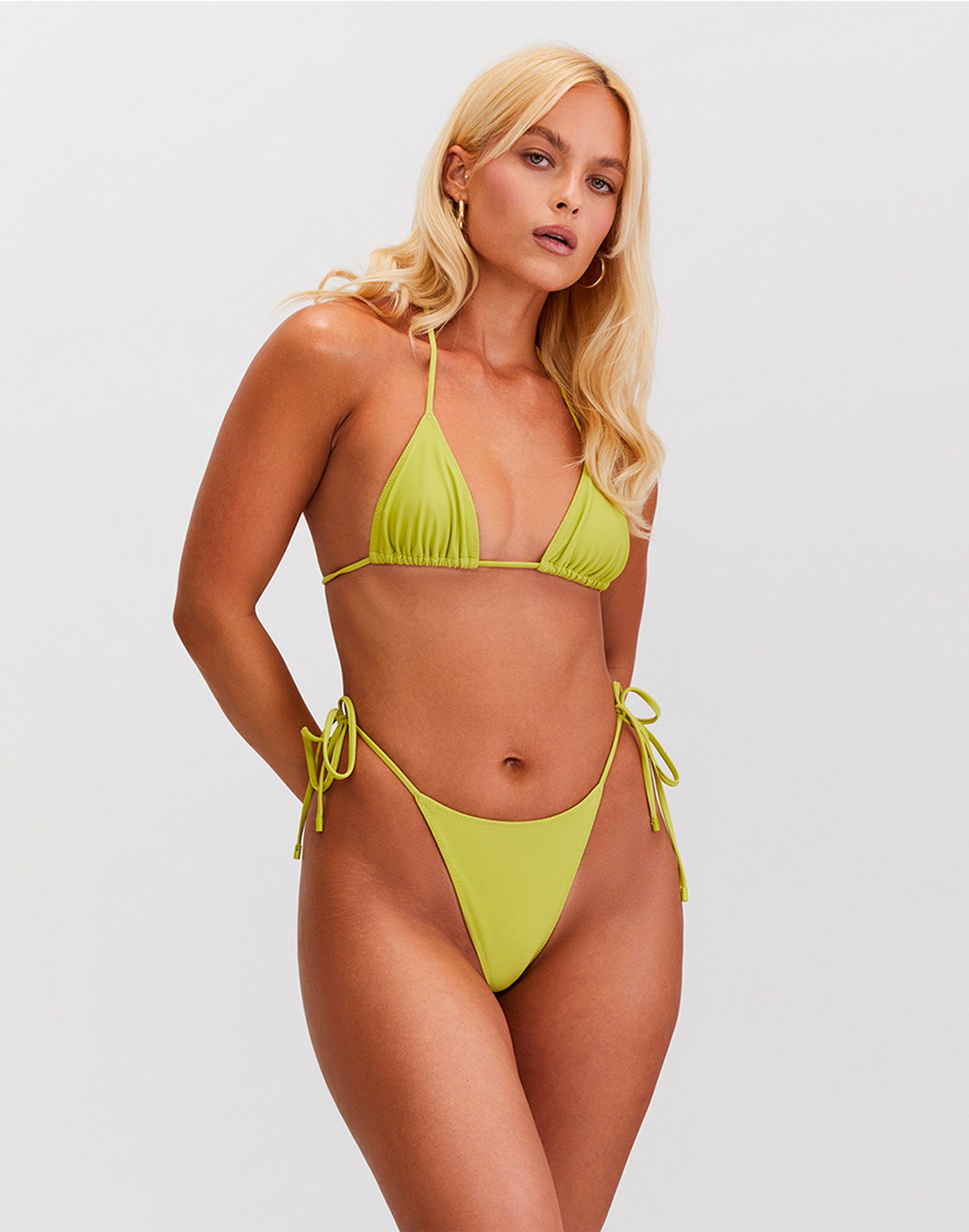 https://www.getsunkissed.com/cdn/shop/files/sunkissed-bikini-triangle-bottom-jackfruit-green-4.jpg